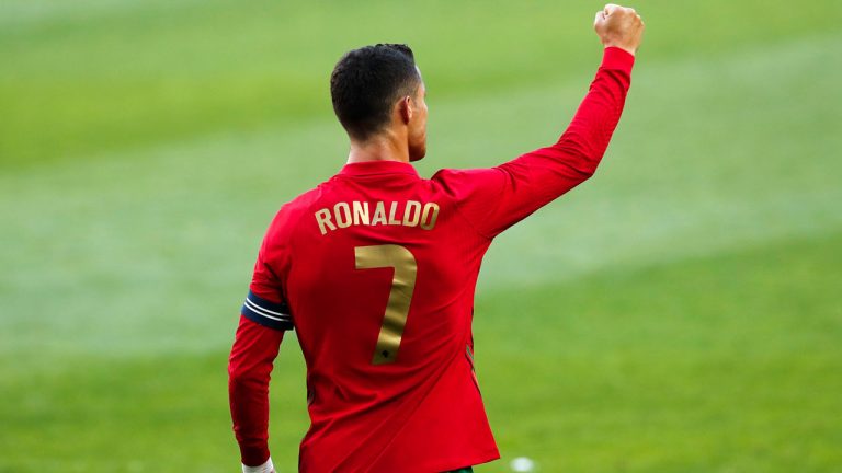 Portugal's Cristiano Ronaldo celebrates after scoring his side's second goal during the international friendly soccer match between Portugal and Israel at the Alvalade stadium. (Armando Franca/AP) 