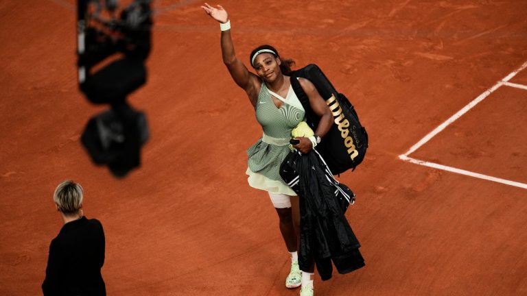 Serena Williams waves to the small crowd as she leaves court following her defeat by Kazakhstan's Elena Rybakina in their fourth round match on day 8, of the French Open tennis tournament at Roland Garros in Paris, France, Sunday, June 6, 2021. (Thibault Camus/AP)