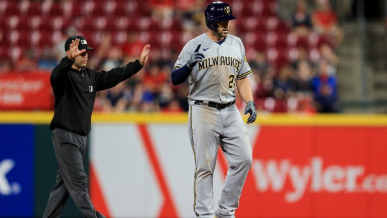 Milwaukee Brewers' Travis Shaw stands on second base after hitting a two-run double during the ninth inning of tgeh team's baseball game against the Cincinnati Reds in Cincinnati, Tuesday, June 8, 2021. The Brewers won 5-1. (Aaron Doster/AP)