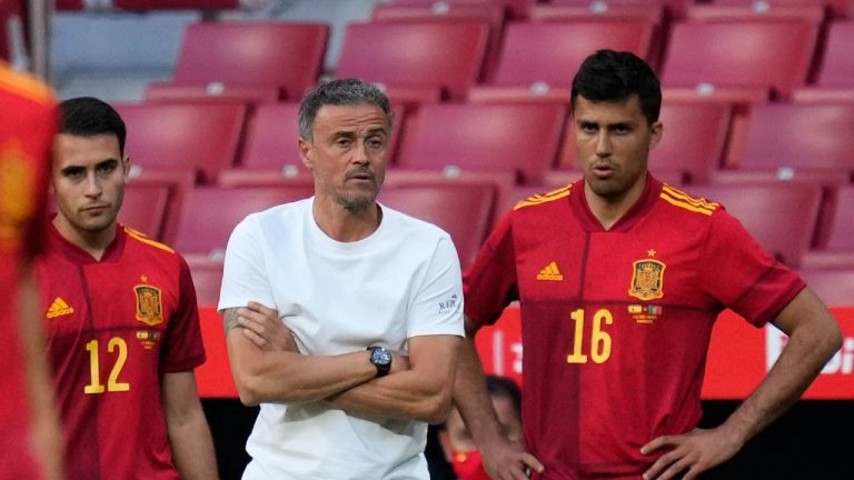 Spain's head coach Luis Enrique, centre, watches the play during the international friendly soccer match between Spain and Portugal at the Wanda Metropolitano stadium in Madrid, Spain on Friday June 4, 2021. (Manu Fernandez/AP) 