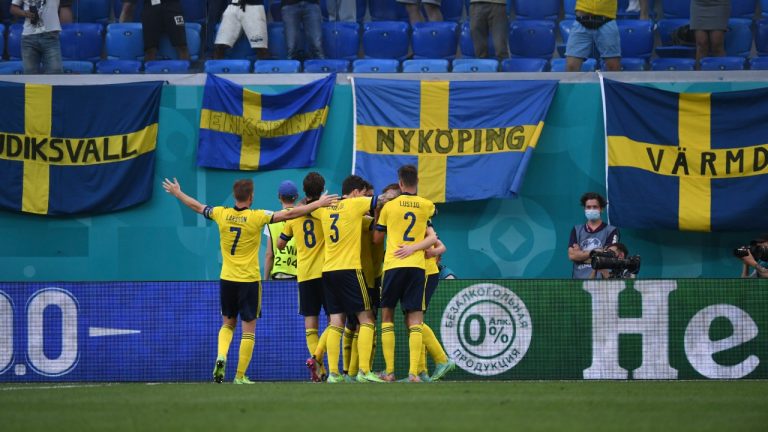 Sweden's Emil Forsberg celebrates with teammates after scoring his side's 2nd goalduring the Euro 2020 soccer championship group D match between Sweden and Poland, at the St. Petersburg stadium in St. Petersburg, Russia, Wednesday, June 23, 2021. (Kirill Kudryavtsev/AP) 