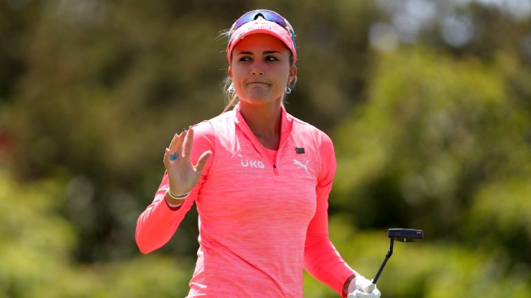 Lexi Thompson acknowledges the crowd after making her putt on the first green during the third round of the U.S. Women's Open golf tournament at The Olympic Club, Saturday, June 5, 2021, in San Francisco. (Jed Jacobsohn/AP)