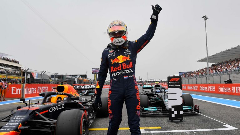 Red Bull driver Max Verstappen of the Netherlands waves to the crowd after he clocked the fastest time during the qualifying session ahead of the French Formula One Grand Prix at the Paul Ricard racetrack in Le Castellet, southern France, Saturday, June 19, 2021. The French Grand Prix will be held on Sunday. (Nicolas Tucat/Pool via AP)