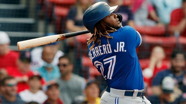 Toronto Blue Jays' Vladimir Guerrero Jr. follows through on his two-run home run during the first inning of a baseball game against the Boston Red Sox, Saturday, June 12, 2021, in Boston. (Michael Dwyer/AP)