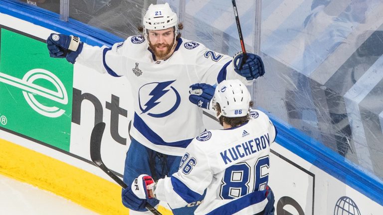 Tampa Bay Lightning centre Brayden Point (21) celebrates his goal against the Dallas Stars with teammate Nikita Kucherov (86) during second period NHL Stanley Cup finals action in Edmonton on Friday, September 25, 2020. (Jason Franson/CP)