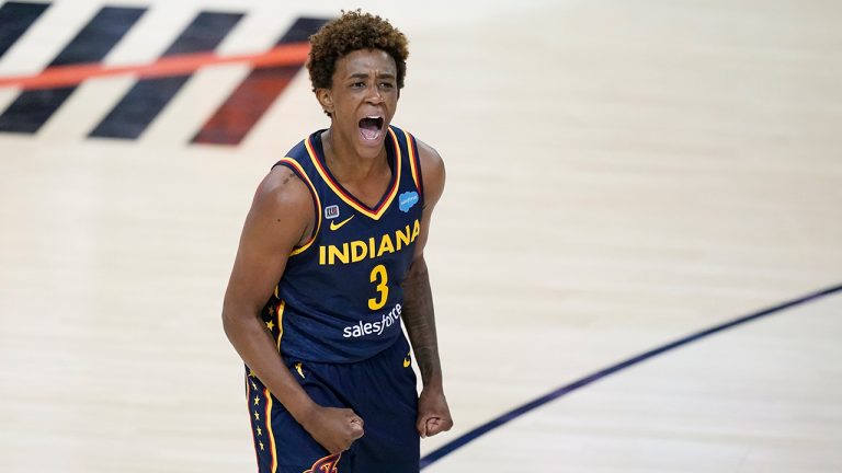 Indiana Fever's Danielle Robinson celebrates after the Fever defeated the Connecticut Sun in a WNBA basketball game, Saturday, July 3, 2021, in Indianapolis. (Darron Cummings/AP)