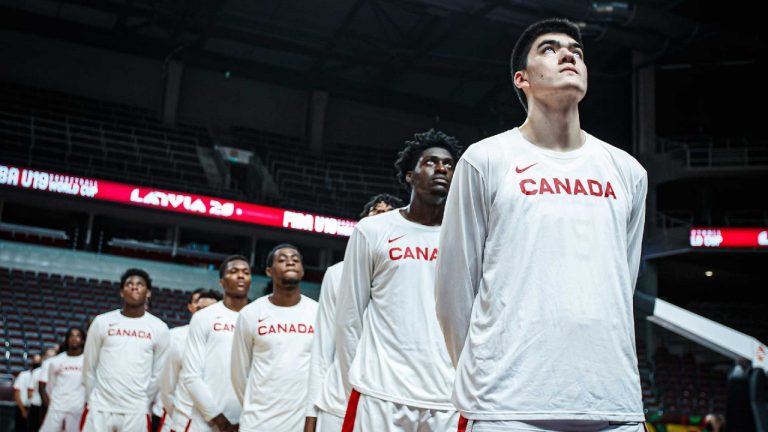 Players on Canada's U19 FIBA World Cup team stand together ahead of their semifinal match against the United States. (@CanBball via Twitter)