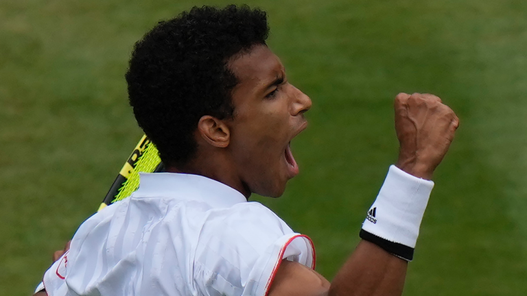 Canada's Felix Auger-Aliassime celebrates winning the second set against Germany's Alexander Zverev. (Alastair Grant / AP)