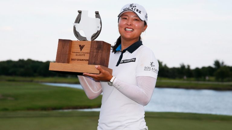Jin Young Ko, of South Korea, holds the winner's trophy after her victory in the LPGA Volunteers of America Classic golf tournament in The Colony, Texas, Sunday, July 4, 2021. (Ray Carlin/AP)