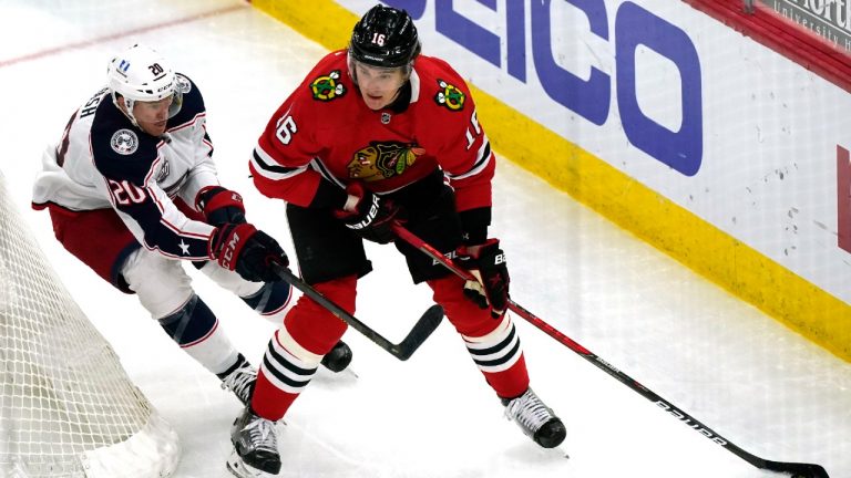 Chicago Blackhawks defender Nikita Zadorov, right, has been traded to the Calgary Flames. (Nam Y. Huh/AP) 