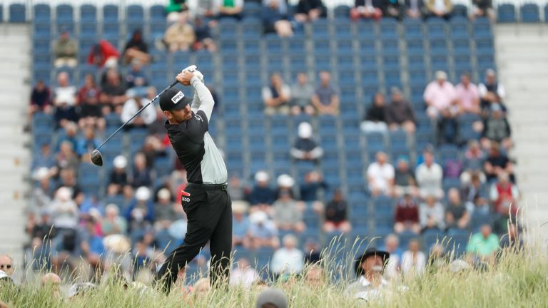 South Africa's Louis Oosthuizen plays his shot from the 17th during the first round British Open Golf Championship at Royal St George's golf course. (Peter Morrison/AP) 