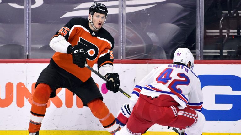 Philadelphia Flyers defenceman Samuel Morin, left, has re-signed with the team. (Derik Hamilton/AP)
