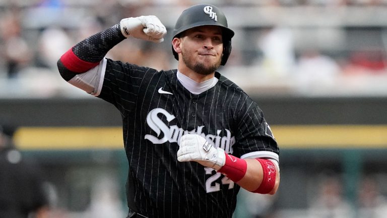 Chicago White Sox's Yasmani Grandal reacts as he rounds the bases after hitting a solo home run during the second inning of a baseball game against the Seattle Mariners in Chicago, Friday, June 25, 2021. (Nam Y. Huh/AP)