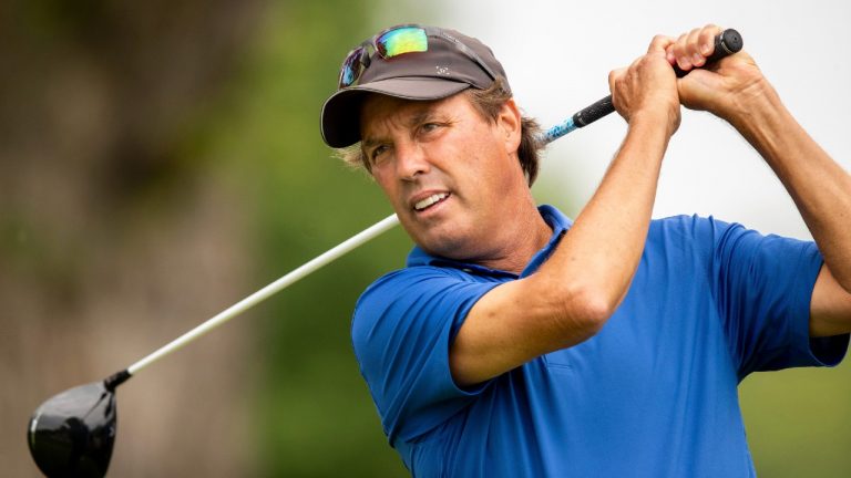 Stephen Ames tees off on the 17th hole during the first round of the U.S. Senior Open golf championship at Omaha Country Club in Omaha, Neb., on Thursday, July 8, 2021. (Anna Reed/Omaha World-Herald via AP) 