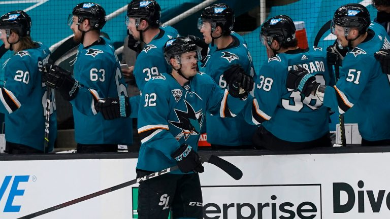 San Jose Sharks forward Rudolfs Balcers, foreground, is congratulated by teammates after scoring against the Minnesota Wild during the second period of an NHL hockey game in San Jose, Calif., Wednesday, March 31, 2021. (Jeff Chiu/AP)