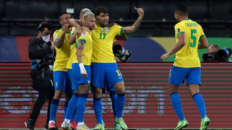 Brazil's Lucas Paqueta, 17, celebrates scoring the opening goal against Chile with teammates during a Copa America quarterfinal soccer match at the Nilton Santos stadium. (Silvia Izquierdo/AP) 