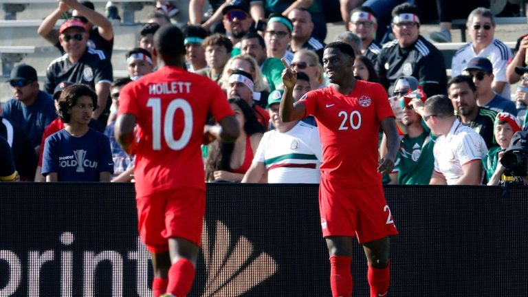 Canada forward Jonathan David (20) celebrates his goal against Martinique during the second half of a CONCACAF Gold Cup soccer match in Pasadena, Calif., Saturday, June 15, 2019. (Ringo H.W. Chiu/AP) 