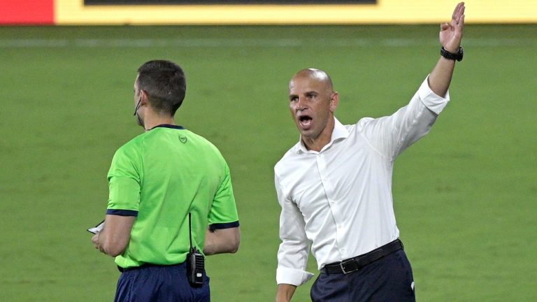 Former Toronto FC coach Chris Armas, right, argues with an official during the second half of the team's MLS soccer match against Orlando City, Saturday, June 19, 2021, in Orlando, Fla. (Phelan M. Ebenhack/AP)