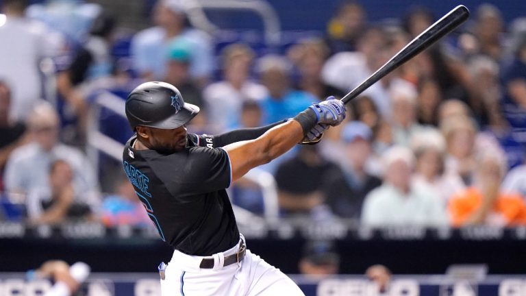 Miami Marlins' Starling Marte hits a single during the first inning of the team's baseball game against the San Diego Padres, Friday, July 23, 2021, in Miami. (Lynne Sladky/AP) 