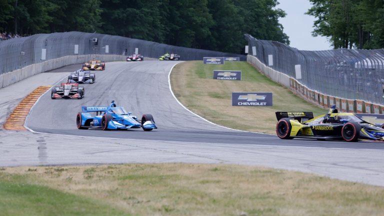 Alex Palou, front left, competes during an IndyCar race at Road America in Elkhart Lake, Wisc., Sunday, June 20, 2021. (Jeffrey Phelps/AP)