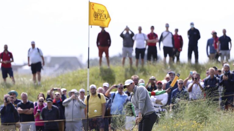 Northern Ireland's Rory McIlroy chips onto the 2nd green during the second round of the British Open Golf Championship at Royal St George's golf course. (Ian Walton/AP)