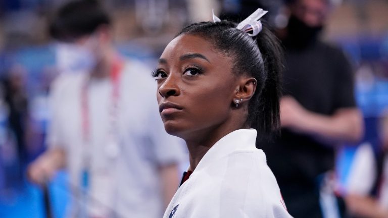 Olympic champion Simone Biles is one of nearly 90 survivors suing the FBI for failing to stop Larry Nassar. (Gregory Bull/AP)