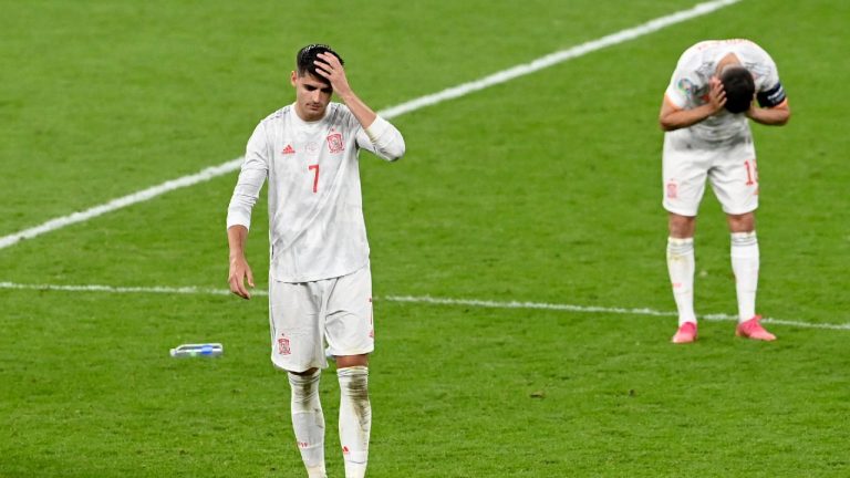 Spain's Alvaro Morata and Jordi Alba, right, react at the end of the Euro 2020 soccer championship semifinal match between Italy and Spain at Wembley stadium in London, Tuesday, July 6, 2021. Italy defeated Spain 4-2 in a penalty shootout after the game ended tied 1-1 after extra time.(Facundo Arrizabalaga/Pool Photo via AP) 