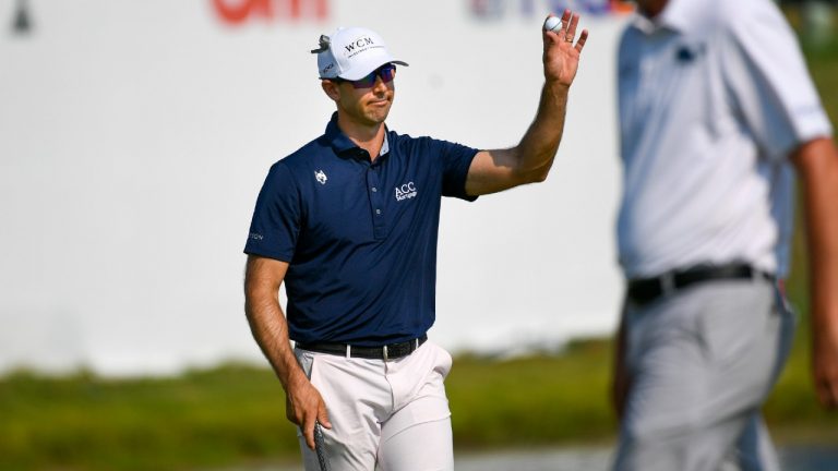 Cameron Tringale acknowledges the crowd after finishing the third round in the lead at 12 under par in the 3M Open golf tournament in Blaine, Minn., Saturday, July 24, 2021. (Craig Lassig/AP)