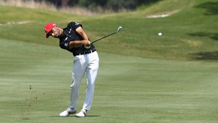 Abraham Ancer hits on the fifth hole during the third round in the World Golf Championship-FedEx St. Jude Invitational tournament. (John Amis/AP)