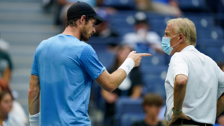 Andy Murray, of Great Britain, complains to an official between sets against Stefanos Tsitsipas, of Greece, during the first round of the US Open tennis championships, Monday, Aug. 30, 2021, in New York. (Seth Wenig / AP)