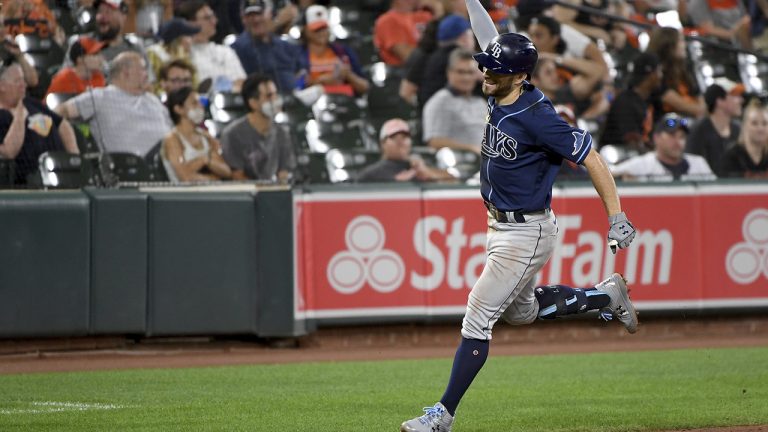 Tampa Bay Rays' Brandon Lowe celebrates while rounding the bases after hitting a grand slam against the Baltimore Orioles in the eighth inning of a baseball game Saturday, Aug. 7, 2021, in Baltimore. (Will Newton/AP)