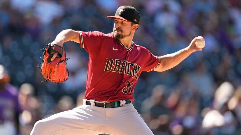 Arizona Diamondbacks relief pitcher Caleb Smith works against the Colorado Rockies in the sixth inning of a baseball game Sunday, Aug. 22, 2021, in Denver (Dave Zalubowski/AP).