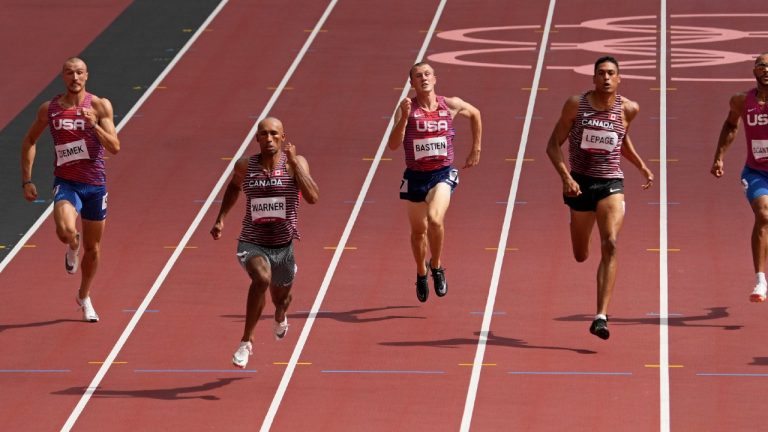Zachery Ziemek, of United States, Damian Warner, of Canada, Steven Bastien, of United States, Pierce Lepage, of Canada and Garrett Scantling, of United States, from left, compete in the decathlon 100-metres at the 2020 Tokyo Olympics. (Charlie Riedel/AP)