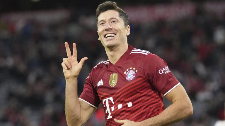 Bayern's Robert Lewandowski celebrates after scoring his side's fifth goal during the German Bundesliga soccer match between Bayern Munich and Hertha Berlin at the Allianz Arena stadium in Munich, Germany, Saturday, Aug. 28, 2021. (Matthias Schrader/AP)