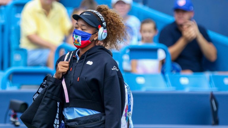 Naomi Osaka enters Center Court during the Western & Southern Open tennis tournament at the Lindner Family Tennis Center (Cara Owsley/The Cincinnati Enquirer via AP).