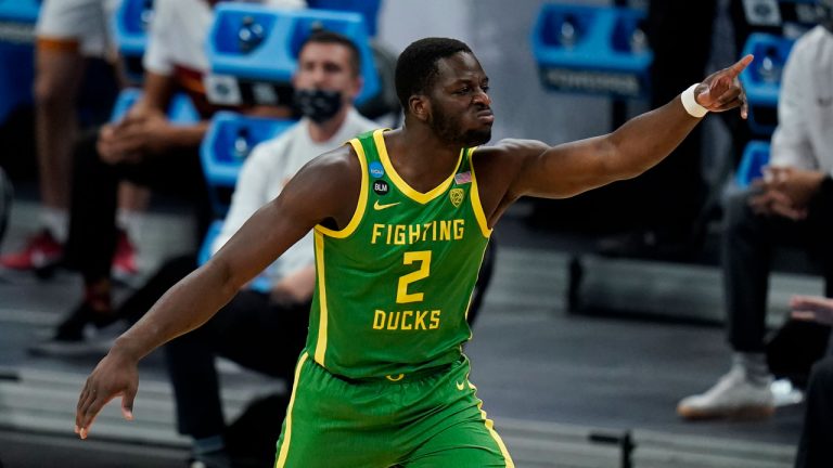 Oregon forward Eugene Omoruyi celebrates after scoring during the first half of a Sweet 16 game against Southern California in the NCAA men's college basketball tournament at Bankers Life Fieldhouse. (Jeff Roberson/AP)