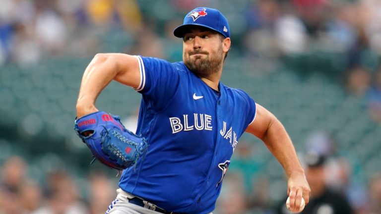 Toronto Blue Jays starting pitcher Robbie Ray throws against the Seattle Mariners in the first inning of a baseball game Friday, Aug. 13, 2021, in Seattle (Elaine Thompson/AP).