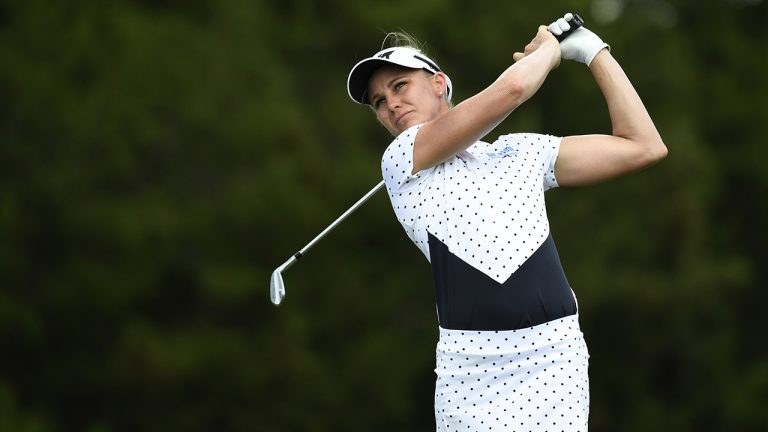 Ryann O'Toole hits a tee shot. (Stan Badz/AP)