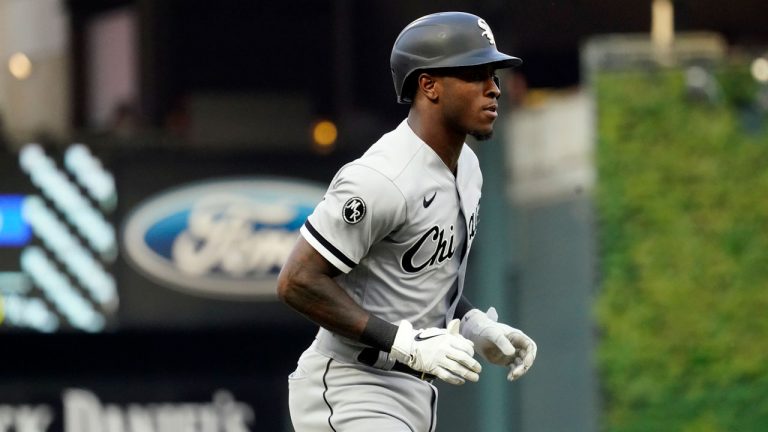 Chicago White Sox's Tim Anderson jogs home on a solo home run off Minnesota Twins pitcher Beau Burrows in the first inning of a baseball game. (Jim Mone/AP) 