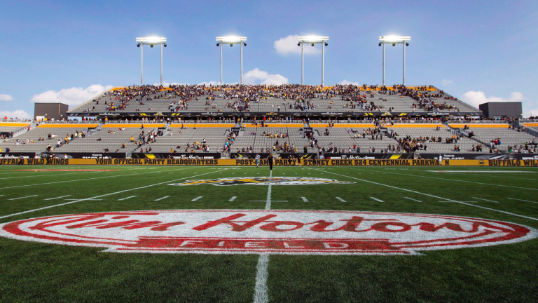 Hamilton Tiger-Cats fans leave the east grandstand following the annual CFL Labour Day Classic against the Toronto Argonauts and the inaugural game at the new Tim Hortons Field in Hamilton, Ont., on September 1, 2014. (Aaron Lynett / CP)