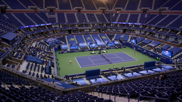 In this Sept. 13, 2020, file photo, Alexander Zverev, left, of Germany, returns a shot to Dominic Thiem, of Austria, during the men's singles final of the U.S. Open tennis tournament in New York. (Seth Wenig / AP)