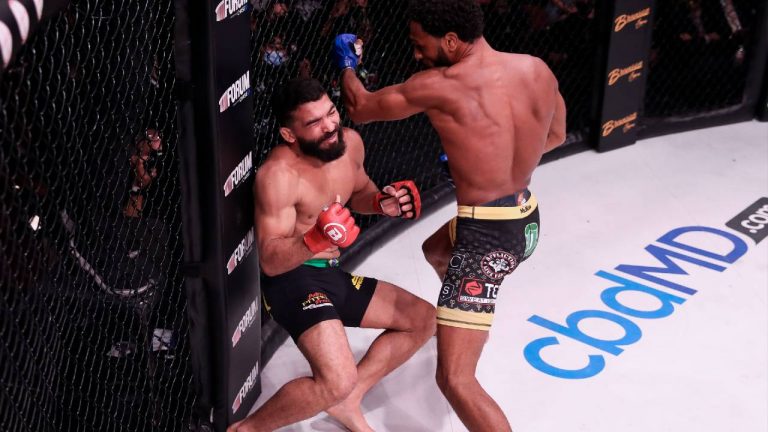 Patricio "Pitbull" Freire falls after being hit by AJ McKee during their featherweight title fight at Bellator 263. (Bellator MMA)