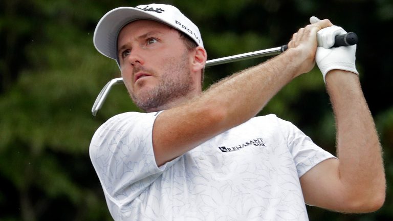 Russell Henley hits his tee shot on the 16th hole during the third round of the Wyndham Championship golf tournament at Sedgefield Country Club in Greensboro, N.C., Saturday, Aug. 14, 2021. (Chris Seward/AP)