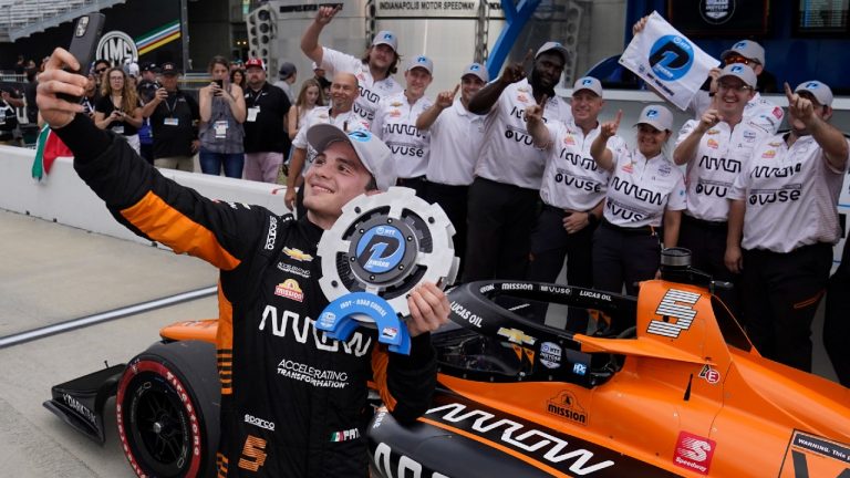 Pato O'Ward, of Mexico, reacts after winning the pole for an IndyCar auto race at Indianapolis Motor Speedway, Friday, Aug. 13, 2021, in Indianapolis. (Darron Cummings/AP) 