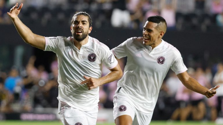 Inter Miami midfielders Rodolfo Pizarro, left, and Víctor Ulloa (13) celebrate after Pizarro scored a goal during the first half of an MLS soccer match against Toronto FC, Saturday, Aug. 21, 2021, in Fort Lauderdale, Fla. (Rhona Wise/AP)