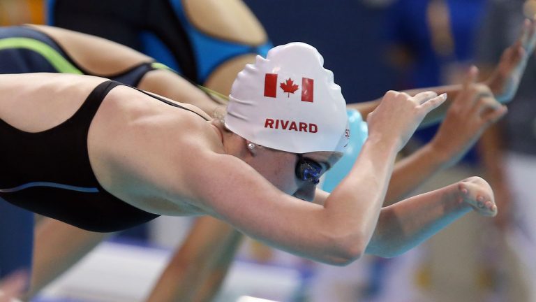 Canadian Paralympic swimmer Aurelie Rivard dives into the pool. (Swimming Canada)