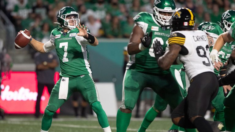Saskatchewan Roughriders quarterback Cody Fajardo (7) throws the ball during the first half of CFL football action against the Hamilton Tiger-Cats in Regina. (Kayle Neis/CP)