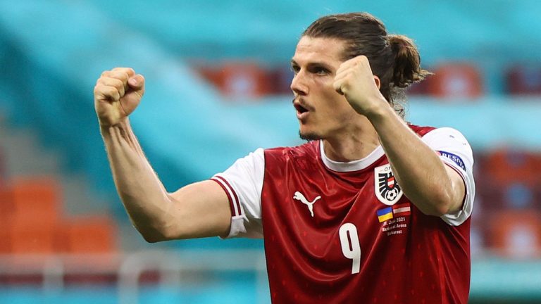 Austria's Marcel Sabitzer celebrates after the Euro 2020 soccer championship group C match between Ukraine and Austria at the National Arena stadium in Bucharest, Monday, June 21, 2021. (Marko Djurica/Pool via AP)