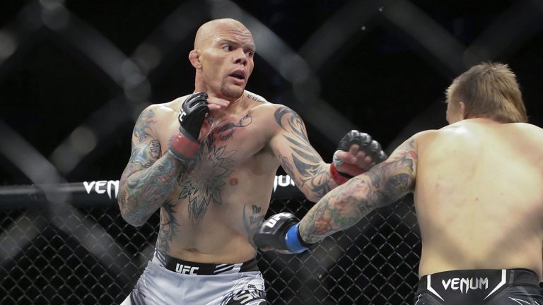 Anthony Smith, left, looks for an opening to hit Jimmy Crute during a UFC 261 mixed martial arts bout. (Gary McCullough/AP)