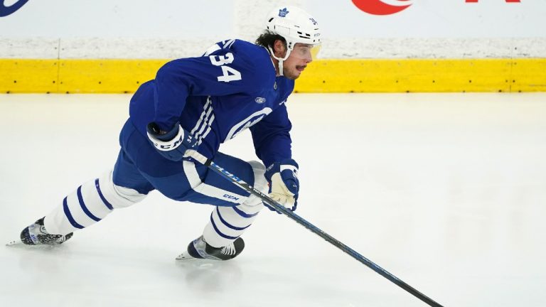Toronto Maple Leafs forward Auston Matthews (34) works on his conditioning and skating efficiency alone on the ice during their NHL training camp in Toronto on Friday, Sept. 24, 2021. Matthews is not skating with the team due to wrist surgery (Nathan Denette/CP).